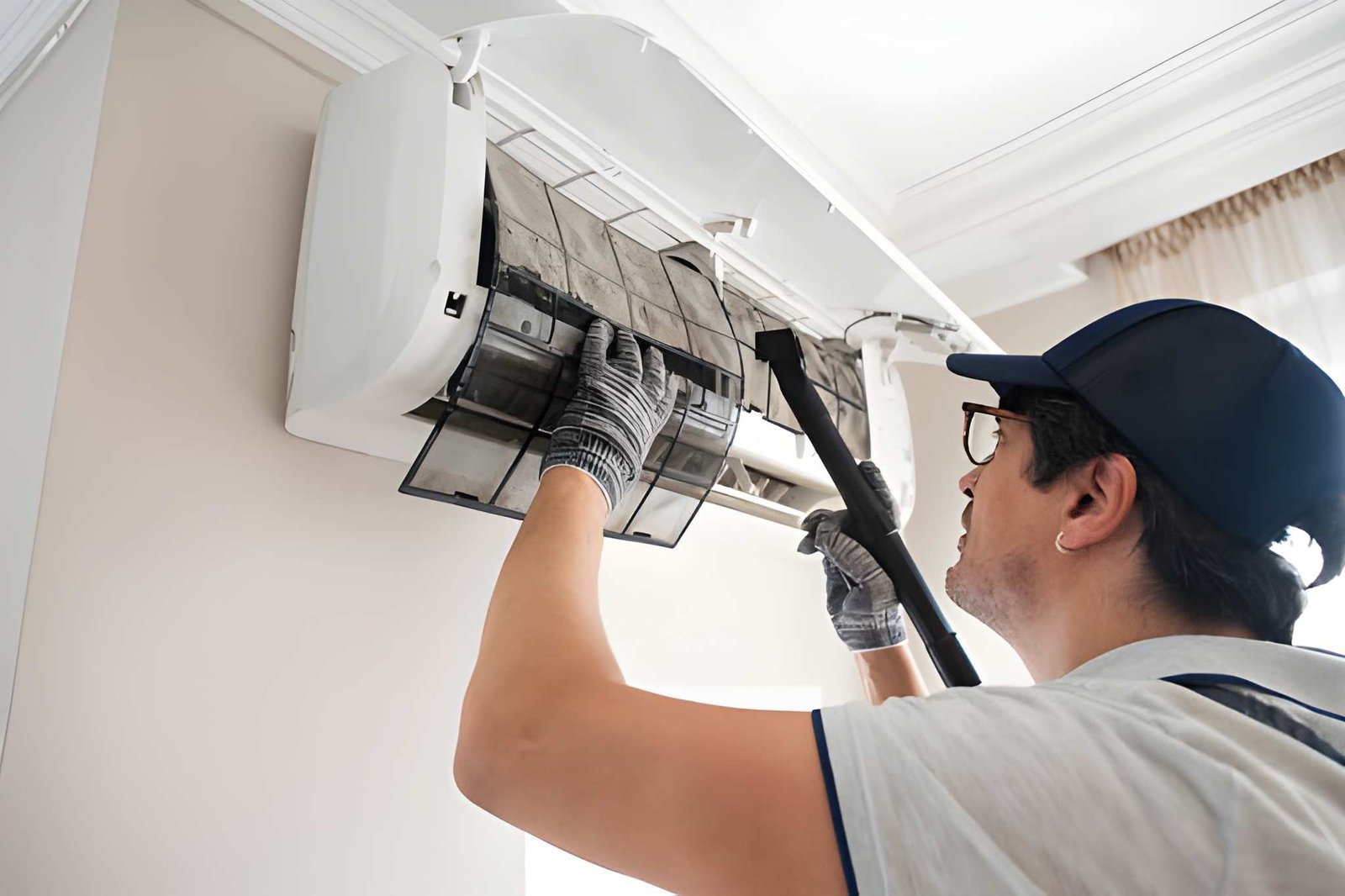 Cross Air duct cleaning technician